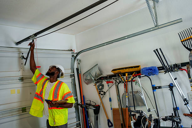 Professional Garage Door Panel Replacement technician working in Jasper County County, IA